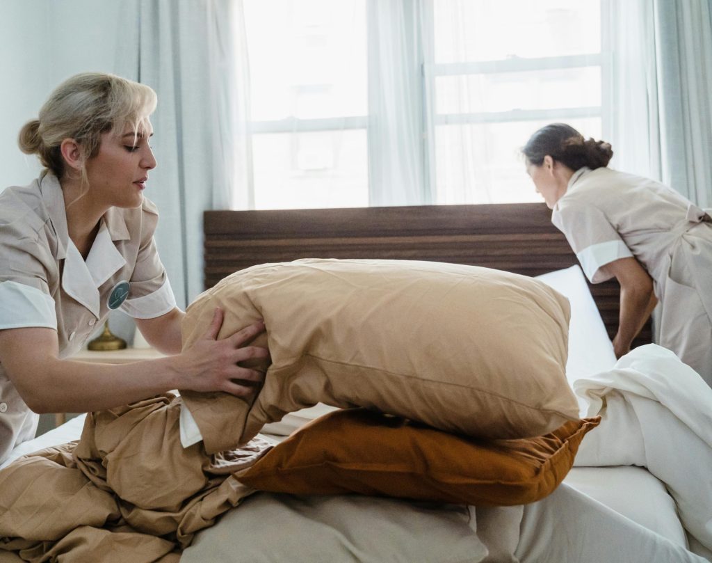 pexels-photo-9462786-9462786 Two Women Making the Bed